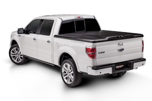 Kuva: UnderCover 09 - 14 Ford F - 150 6.5ft Elite Bed Cover - Black Textured